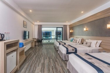 Deluxe Quadruple Room with Balcony