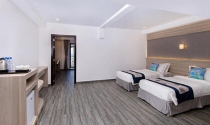 Deluxe Quadruple Room with Balcony