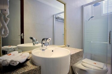 Deluxe Quadruple Room with Balcony