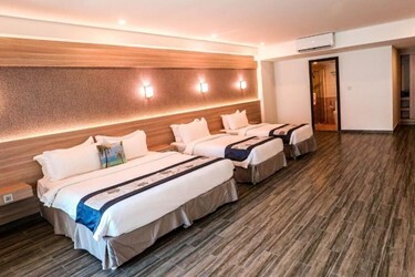 Deluxe Quadruple Room with Balcony