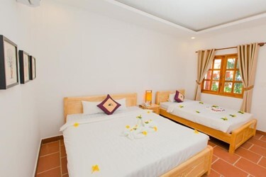 Deluxe Triple Room Garden View