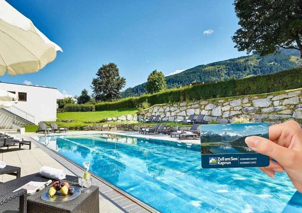 Фотография Das Alpenhaus Kaprun Hotel 4*