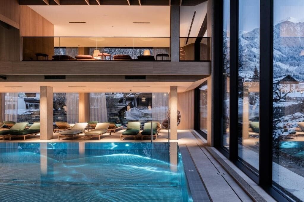 Фото Alpendomizil Neuhaus Mayrhofen 4*