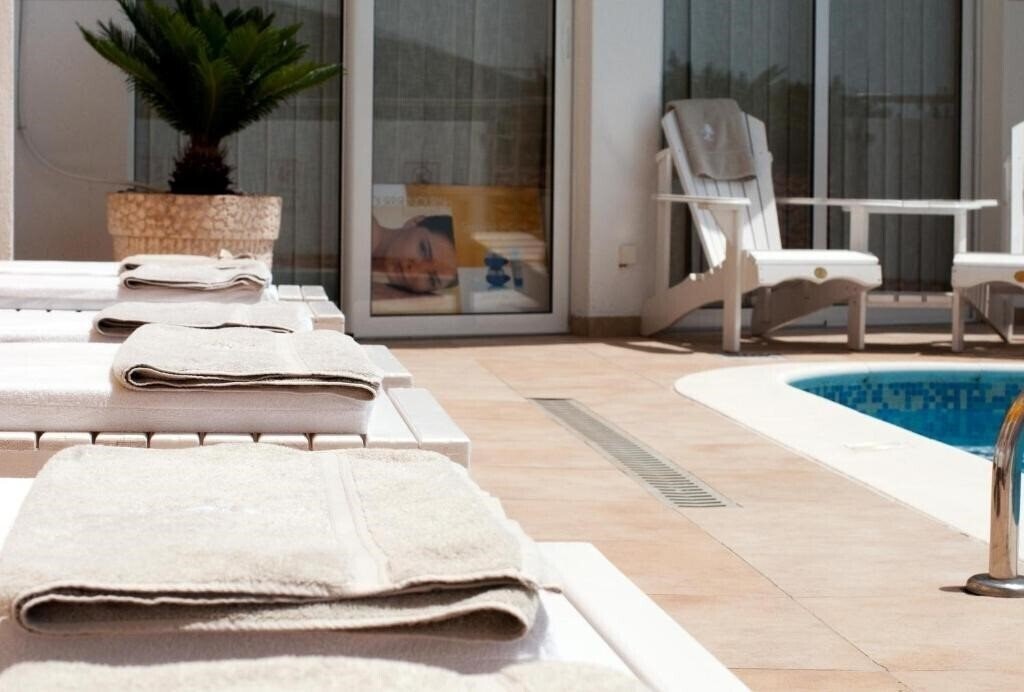 Фотография Kamelija Apartments 4*