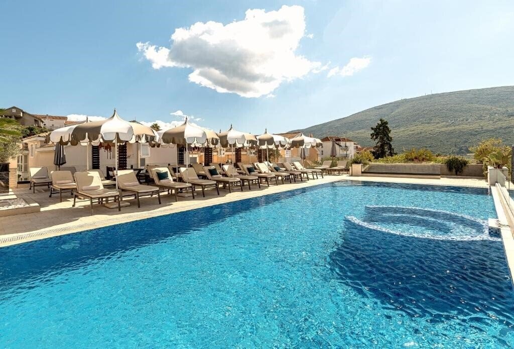 Изображение Sun Village Apartments 4*