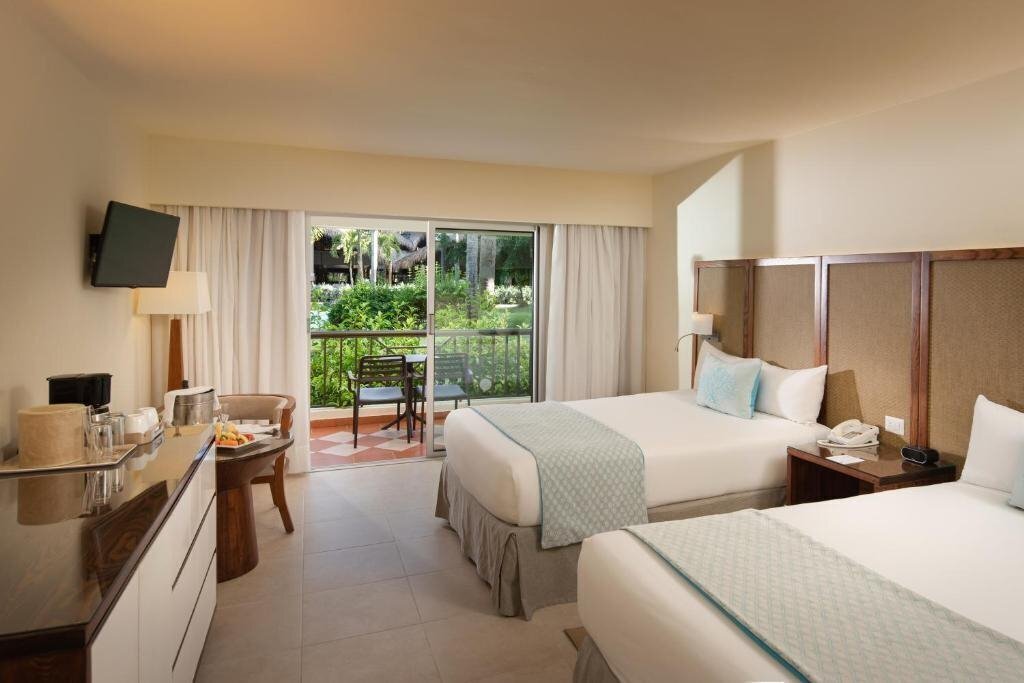Фото Impressive Punta Cana (ex. Sunscape Bavaro Beach, Sunscape Dominican Beach Punta Cana) 5*