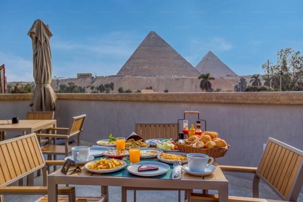 Фото La Boutique Hotel Vue Des Pyramides 3*