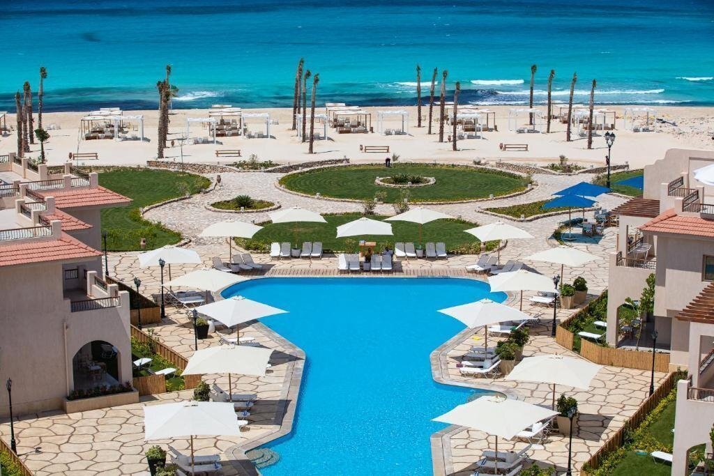 Отель Aqua Heneish Beach Resort 5*