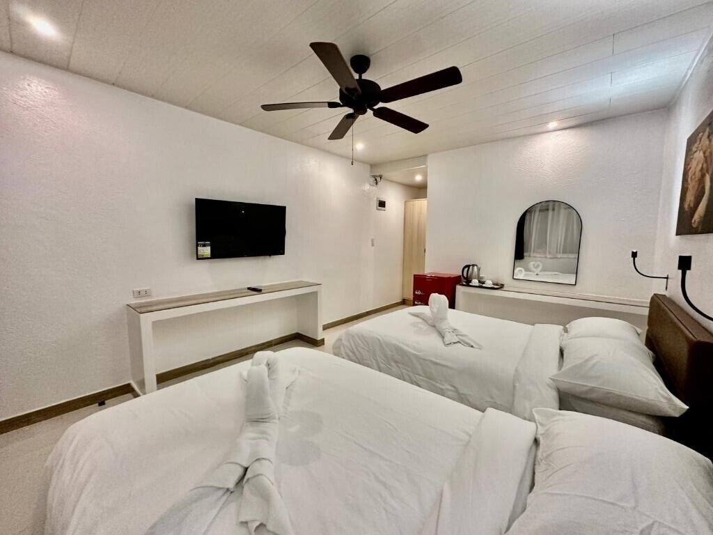 Фотография Calypso Beach & Dive Resort 3*