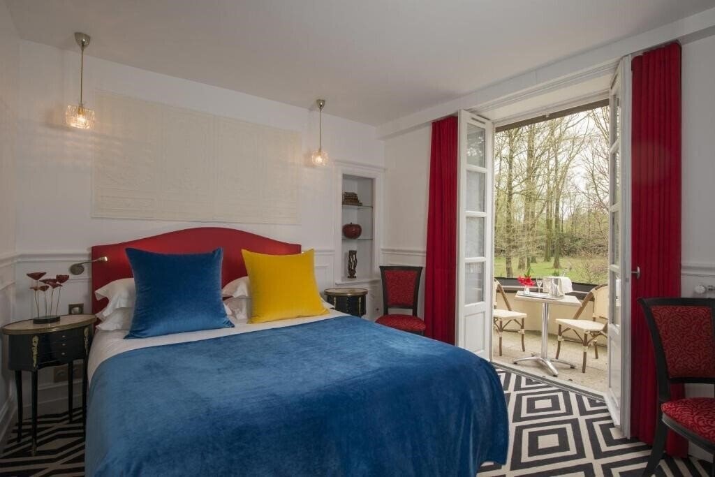 Фото Le Manoir du Lys 4*