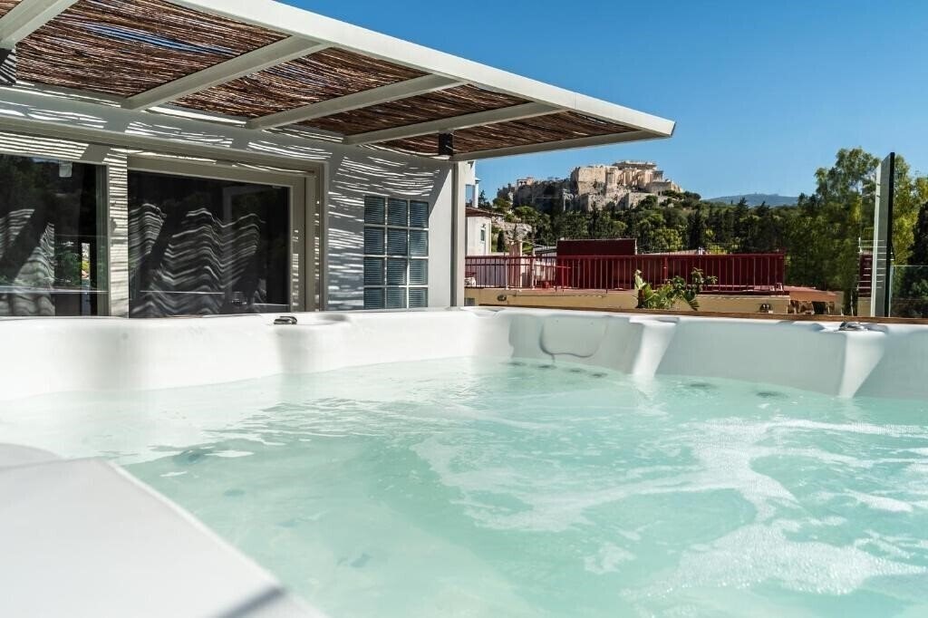 Фотография Acropolis Luxury Apartments 5*