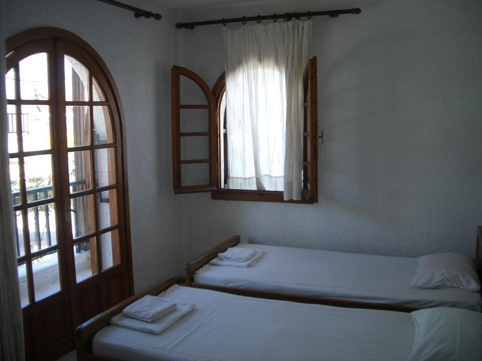 Отель Tzogalis Apartments апартаменты