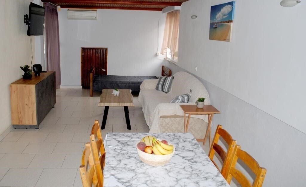 Фотография Artemis Apartments апартаменты