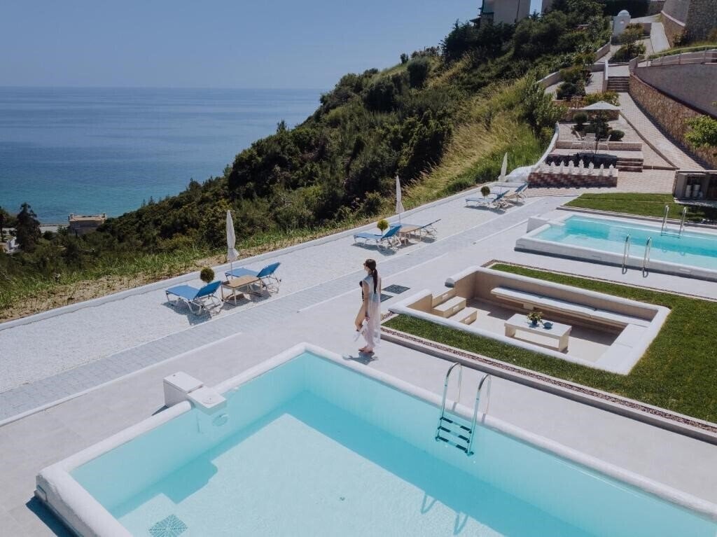 Отель Koumaros Aparthotel Agia Paraskevi 3*