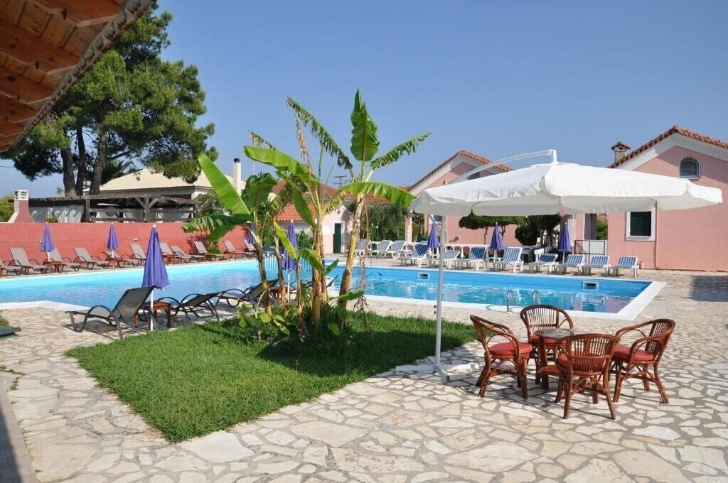 Отель Tassos Apartments & Pool 2*