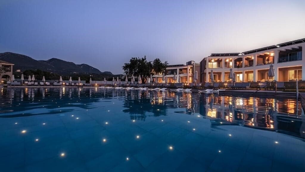 Фотография Acharavi Beach Hotel 4*