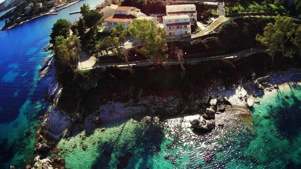 Отель Kassiopi Bay Apart 4*