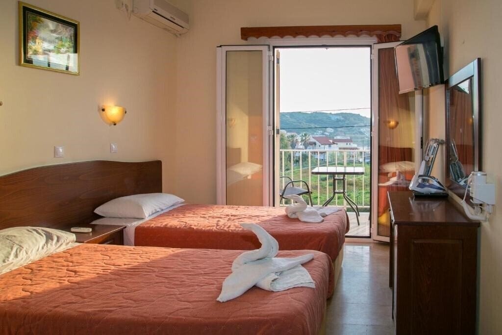 Фото Kouros Apartments & Studios 4*