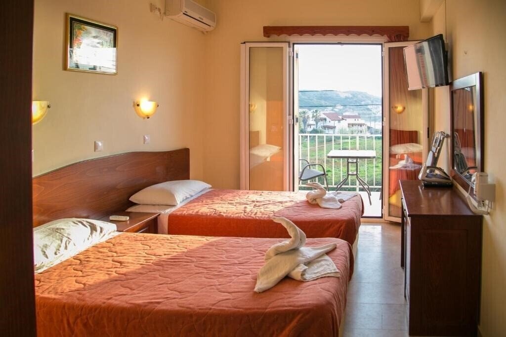 Картинка Kouros Apartments & Studios 4*