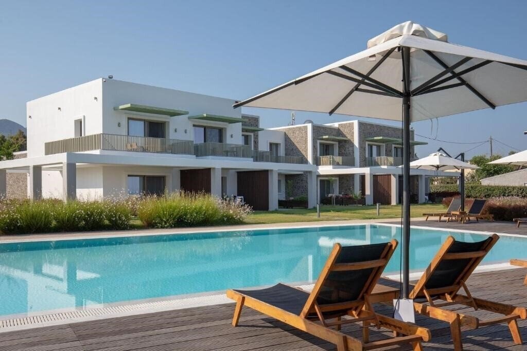 Отель Kyma Suites Acharavi 4*