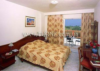 Отель Corali Hotel Tigaki 4*