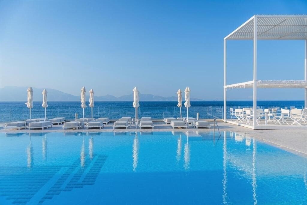 Фото Dimitra Beach Hotel & Suites 5*