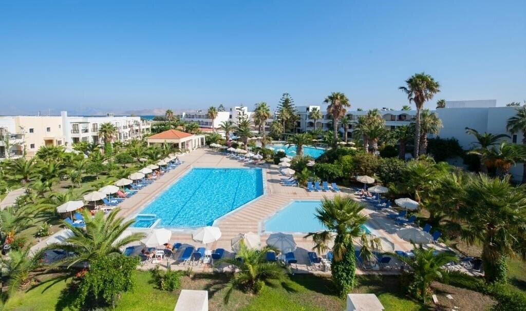 Отель Tigaki Beach 4*