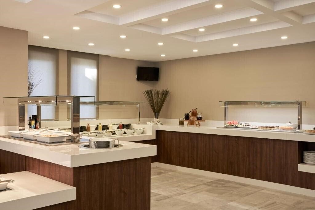 Фотография Amalthia Beach Resort (ex. Amalthia Beach) 4*