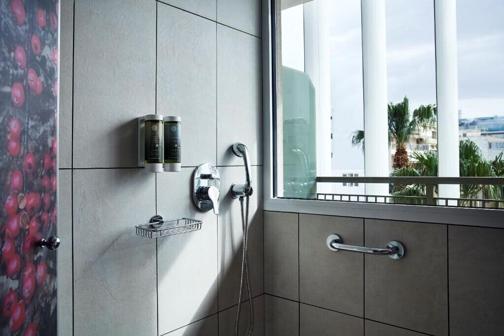 Фотография Olive Green Hotel 4*