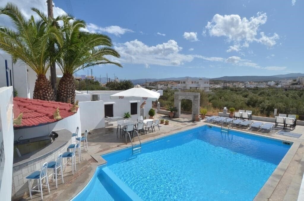 Отель Manos Apartments апартаменты