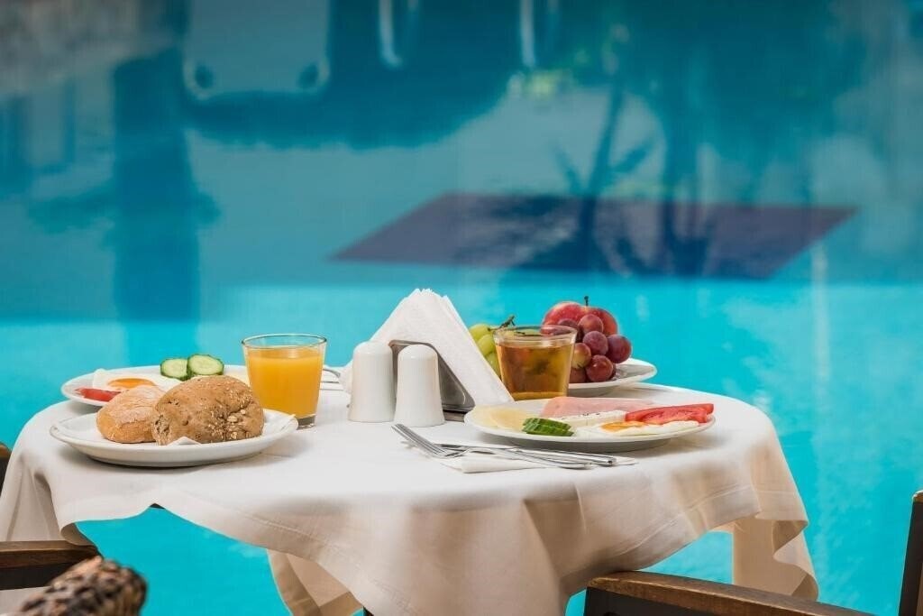 Изображение Minos Village (Agia Marina) 2*