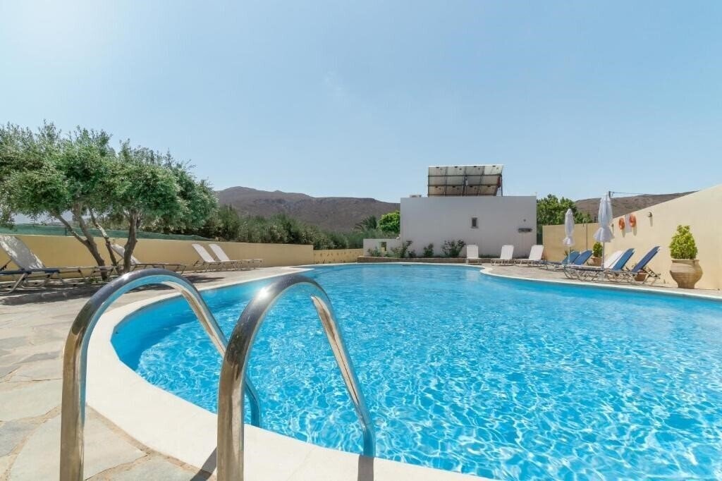 Отель Rousolakos Apartments 4*