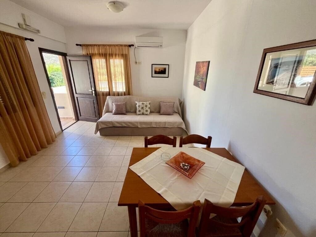 Изображение Rousolakos Apartments 4*