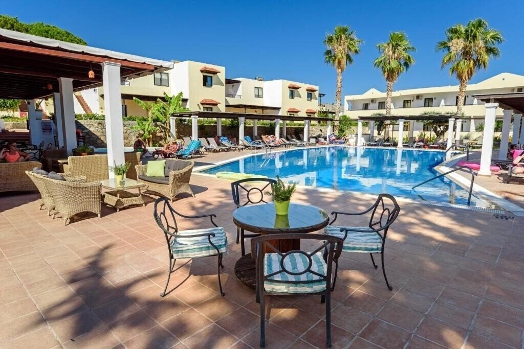 Отель Pefkos Village Resort 3*