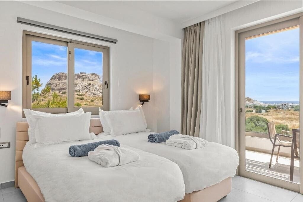 Фото Kouros Stone Suites Apart Hotel 3*