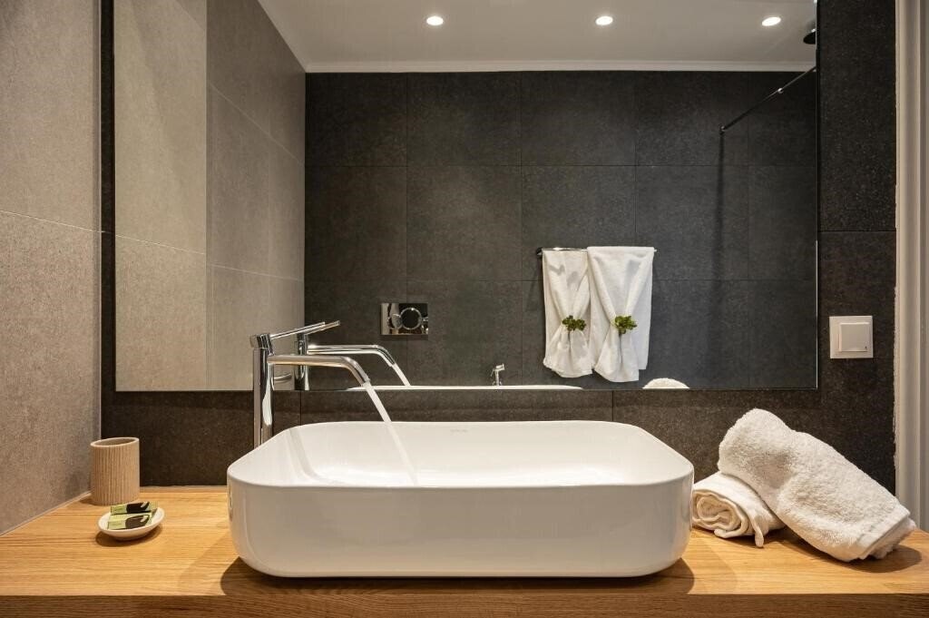 Фотография Athena Beach (Kokkari) отель без категории