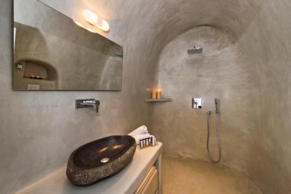 Фото Porto Fira Suites 4*