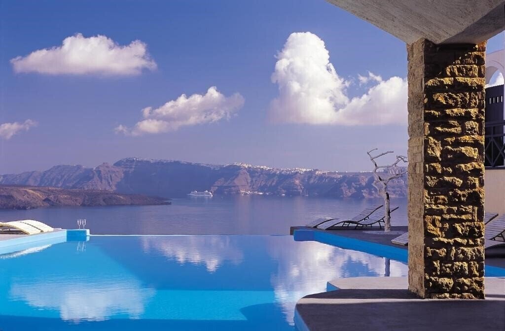 Отель Astarte Suites 5*