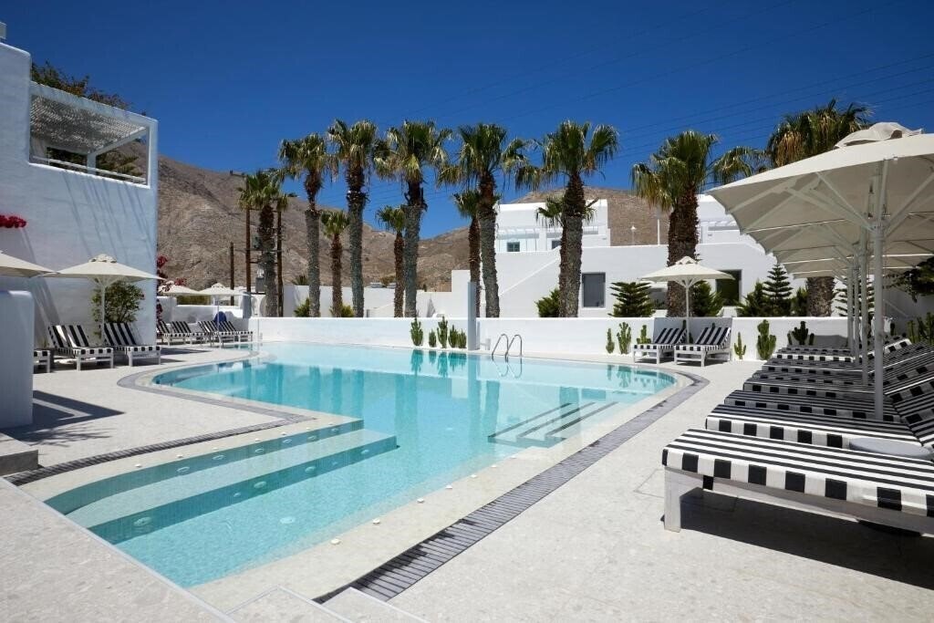 Отель Kouros Village 4*