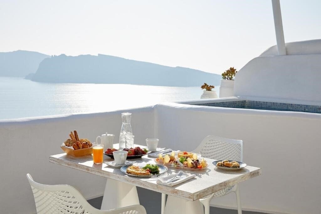 Фотография La Perla Villas & Suites Adults Only 5*