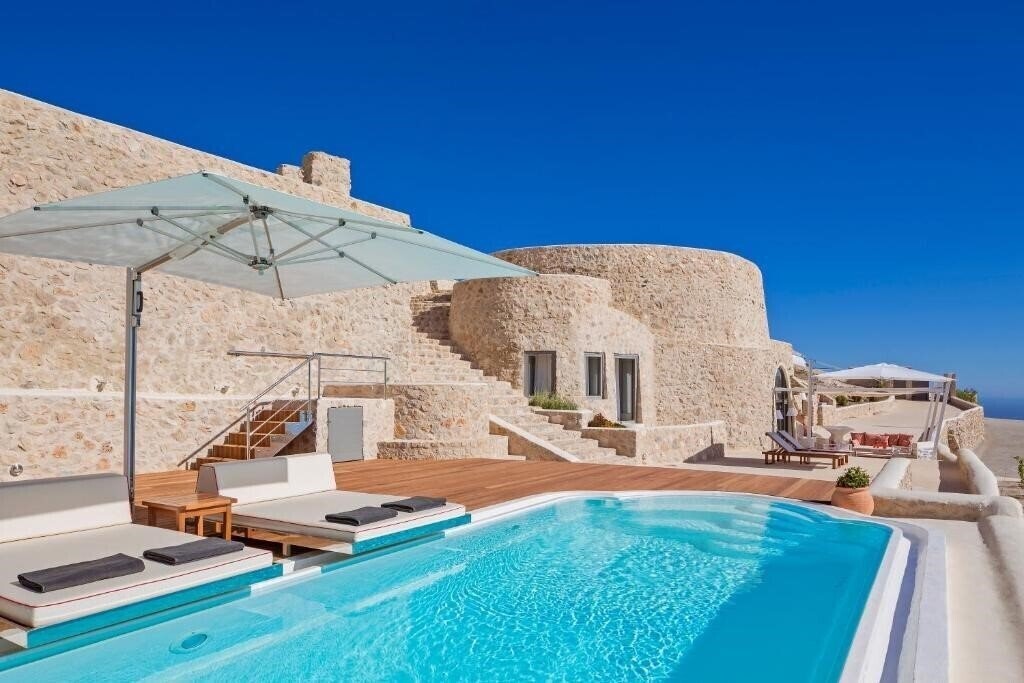 Отель Kamini Santorini Villas 5*