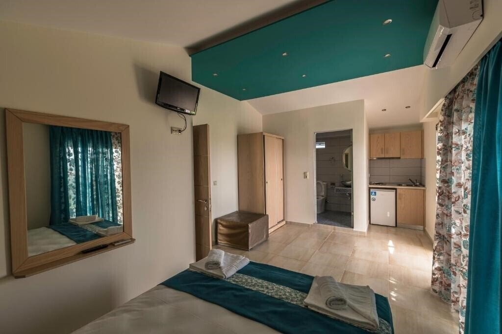 Картинка Rania Studios апартаменты