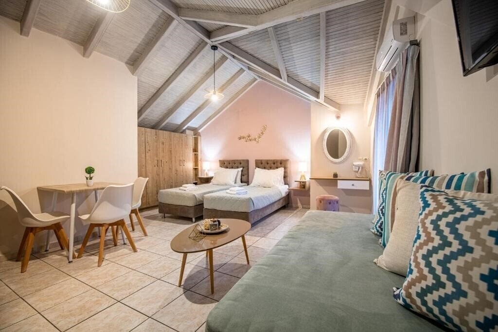 Отель Koukos Loft Apartments апартаменты