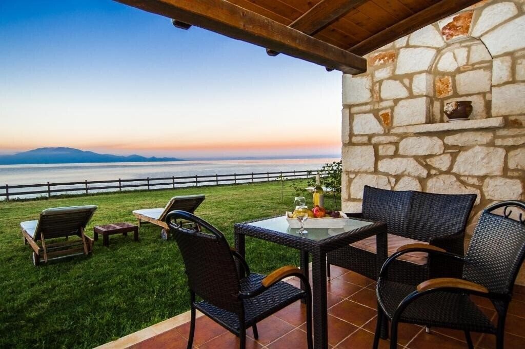 Отель Kavos Psarou Villas 4*