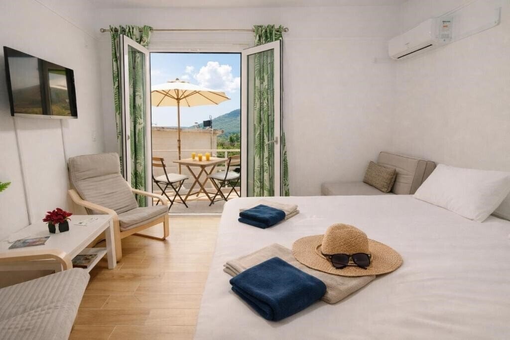 Отель Karavaki Apartments 3*