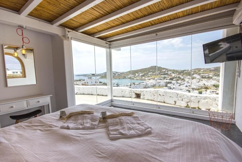 Фото Anixi Lounge Suites - Adults Only 3*