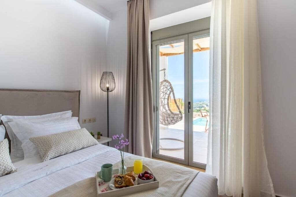 Фото Kallixeni Villas 4*