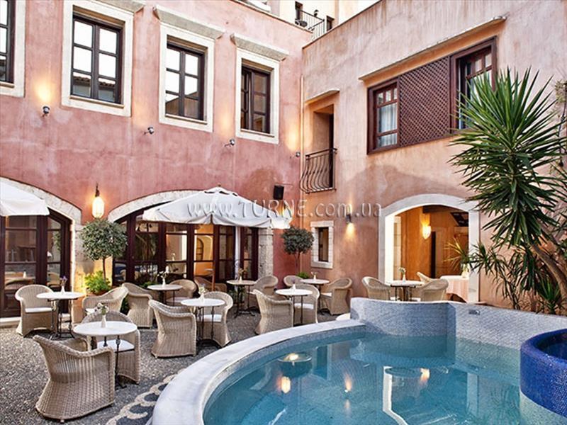 Отель Rimondi Boutique Hotel 4*