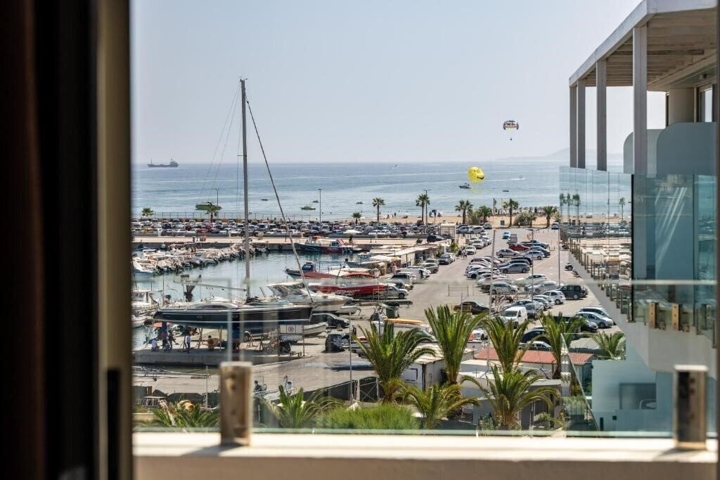 Фото Kyma Suites Beach Hotel 5*
