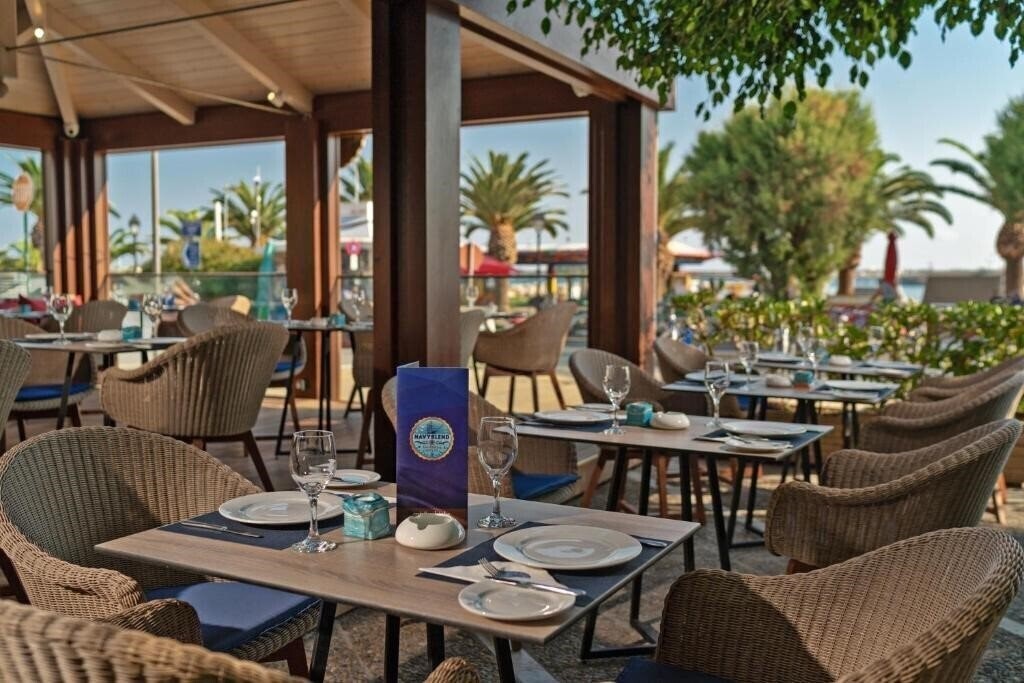 Фотография Kyma Suites Beach Hotel 5*